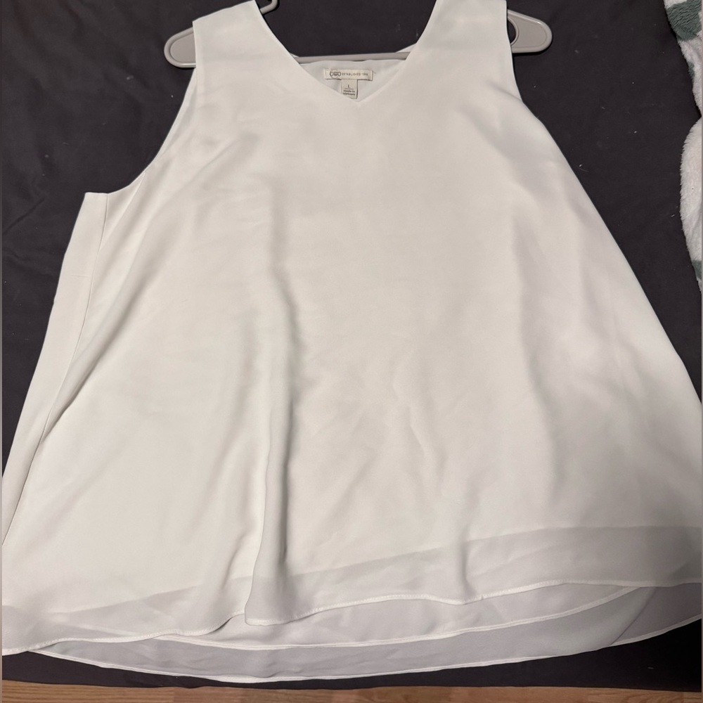 White sleeveless top